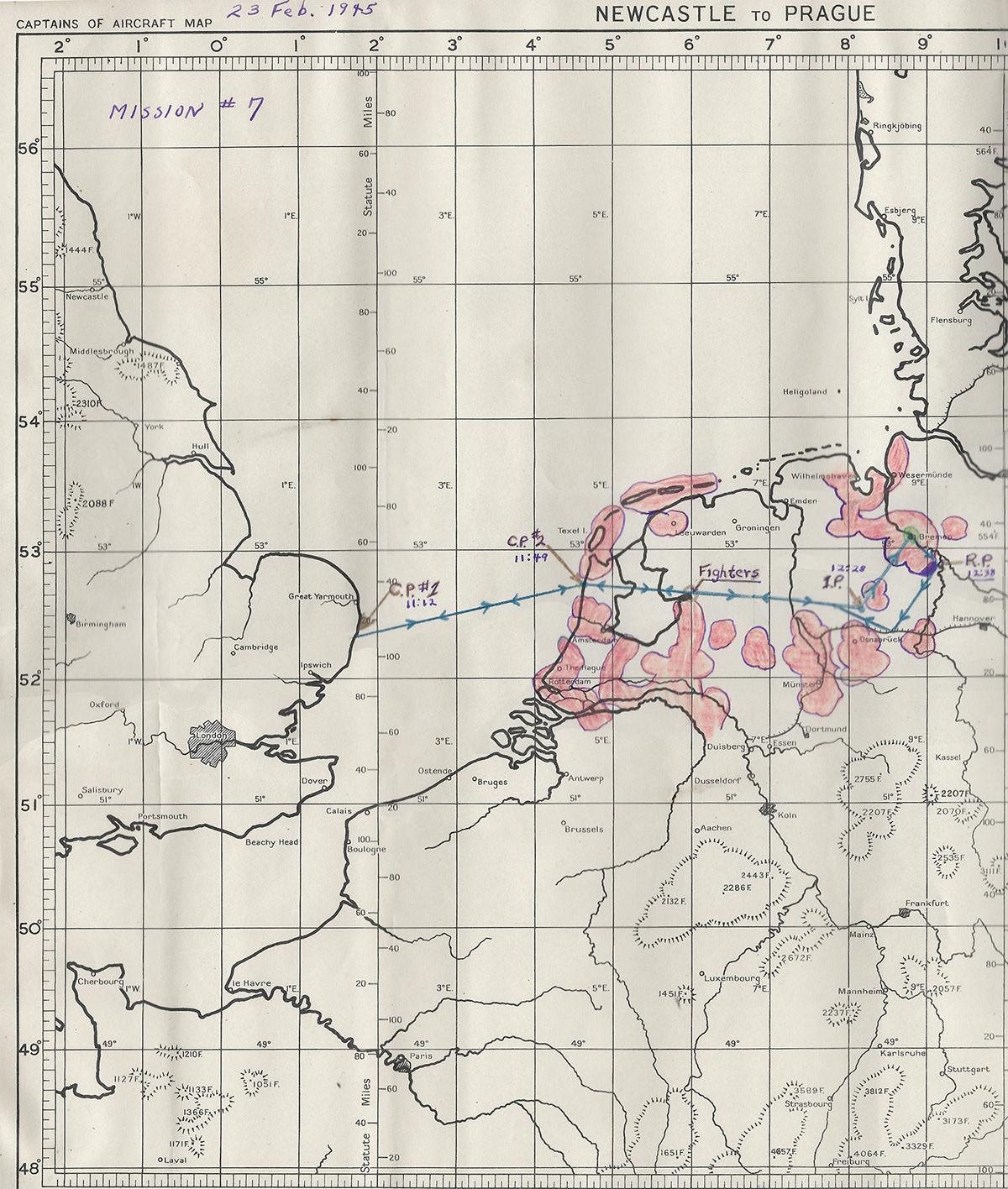 Printed captains’ map of northwest Europe, hand-labeled Mission #7, 23 Feb. 1945, with a penciled route, times, and pink flak shading